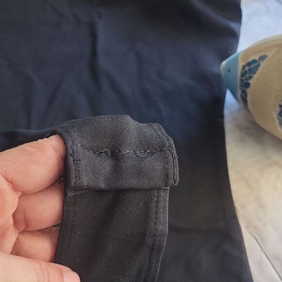 Sleek Black Asymmetrical Sleeveless Bodysuit - Picture 7 of 12